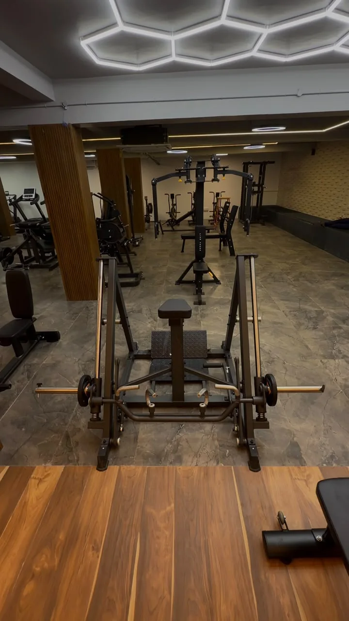Open training floor with gym equipment